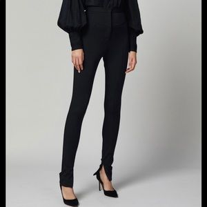 Black pants with bottom zip slip